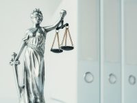 Lady Justice Statue In Law Firm Office